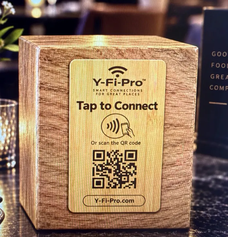 Concept image: Y-Fi-Pro table block in natural oak with an engraved wooden plaque.